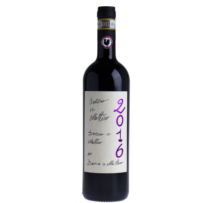 Dark wine bottle with black cap and white label featuring purple 2016