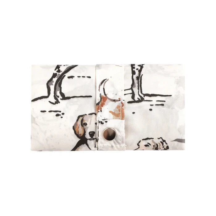 Fabric swatch with dog pattern on a white background