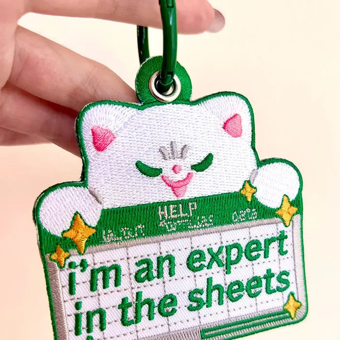 Expert in the Sheets Embroidered Keychain