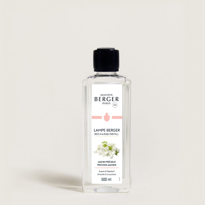 Bottle of Maison Berger lamp refill on a white background