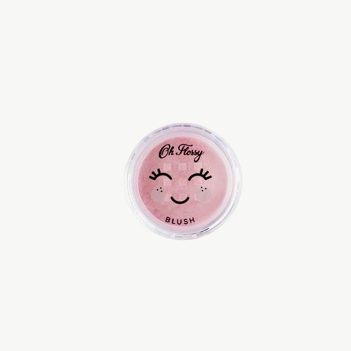 Pink blush compact with 'Oh Flossy' branding on a white background