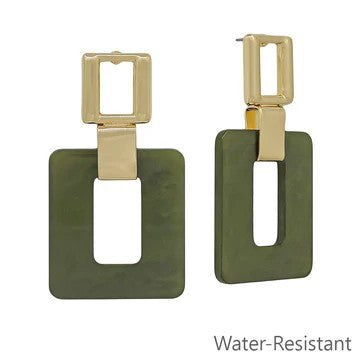 Make a bold statement with these contemporary Acrylic &amp; Gold Square Earrings. Designed with a sleek drop silhouette, these earrings pair polished gold posts with vibrant acrylic accents for a look that's both refined and fashion-forward. The modern geometric aesthetic adds instant sophistication to any outfit.&nbsp;

Size: 2"