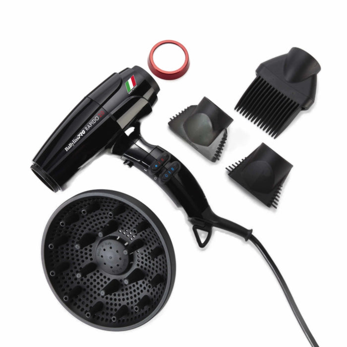 Black hair dryer with various attachments on a white background