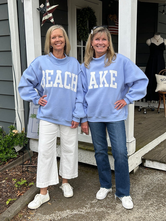 Carolee and Barbara are showing you both sides of this adorable, reversible sweatshirt! It promotes your love of the LAKE on oneside and the BEACH on the other.!