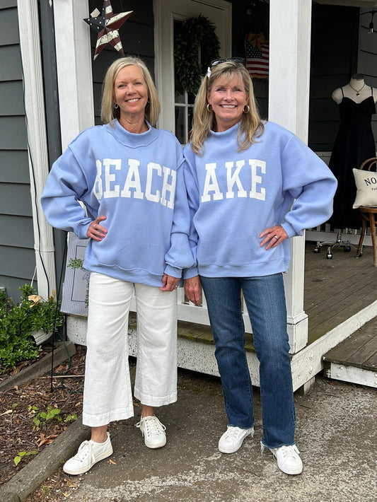Carolee and Barbara are showing you both sides of this adorable, reversible sweatshirt! It promotes your love of the LAKE on oneside and the BEACH on the other.!