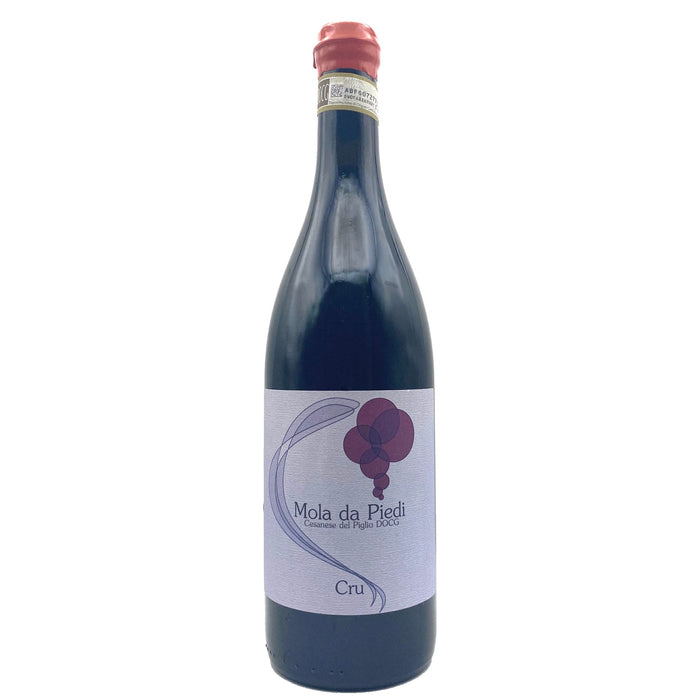 Wine bottle with 'Mola da Piedi' label and 'Cru' text, red cap