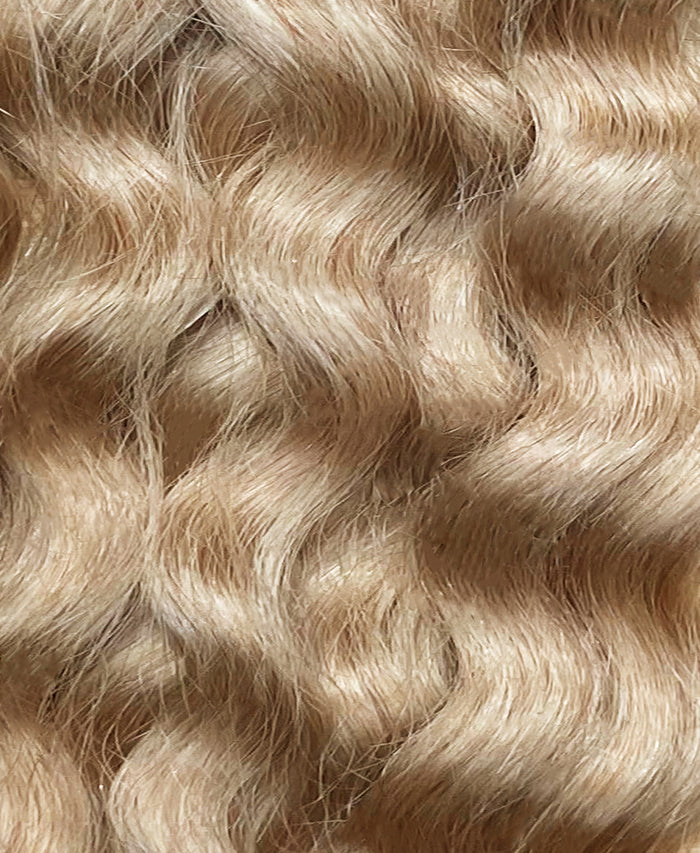 curly ponytail - honey blonde.