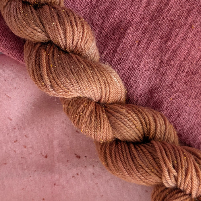 Lac - Laccifer laca/Kerria laca Dyed examples were done at 50% OWG. We used our Silk Hankies (#SH), our Cotton Bubble Gauze (#CG2-50"), and our Single Sock HT Mini Skeins (#YARN104)