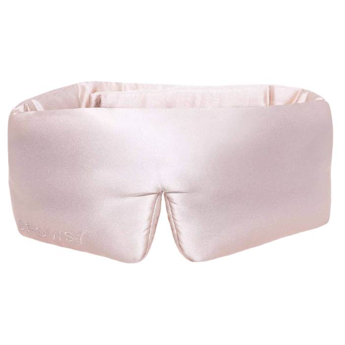 Pink satin eye mask on a white background