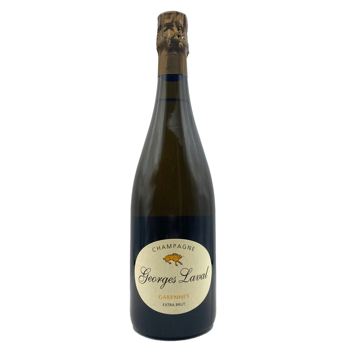 Champagne bottle with gold foil capsule and Georges Laval Garennes Extra Brut label