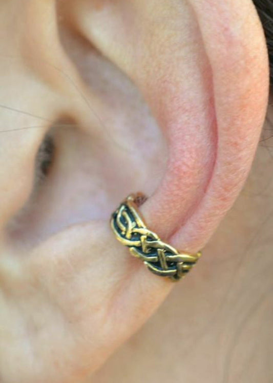 gold celtic knot ear cuff worn on ear non piercing earring side view