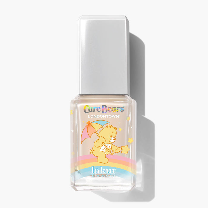 A bottle of LONDONTOWN Good Vibes Only Lakur nail polish in a warm, inviting shade features a joyful Care Bears design with a bear holding an umbrella and standing on a rainbow.