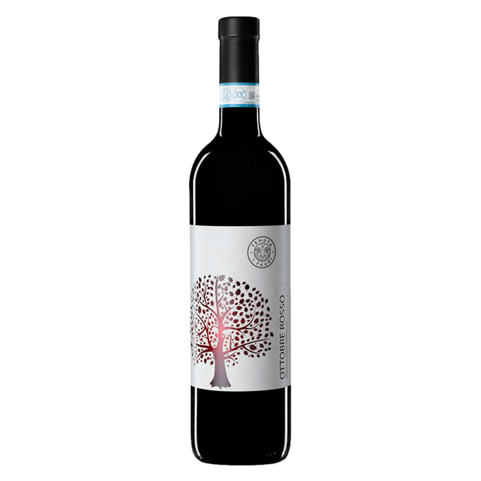 Red wine bottle with tree-and-branch graphic label and dark glass
