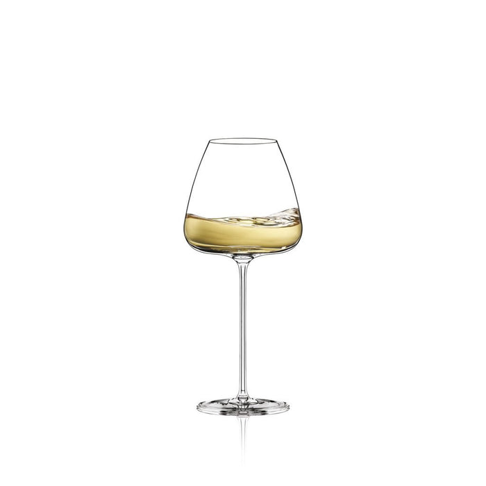 Stemmed glass with rounded bowl, filled with golden amber liquid