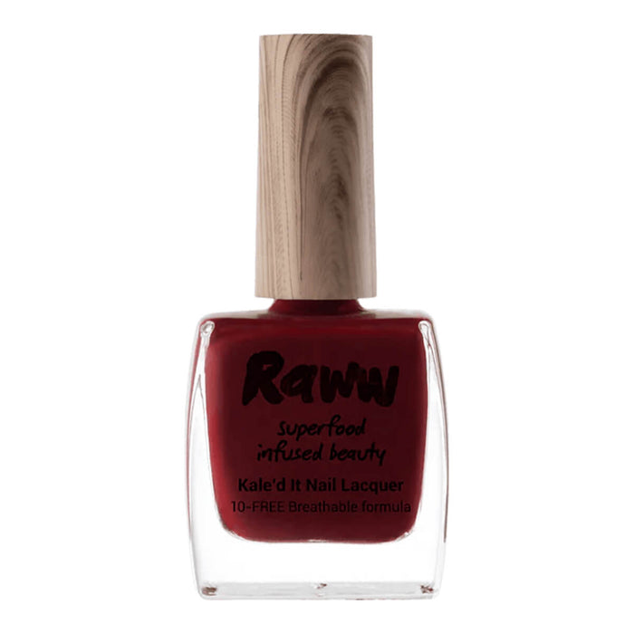 Bottle of non-toxic, deep dark red nail polish with kale protein infusion.