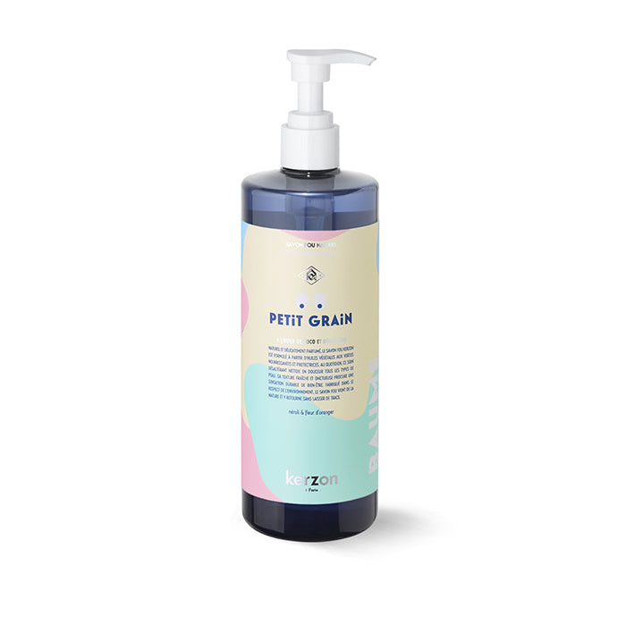 A pump bottle of Kerzon Petit Grain Liquid Soap with a label featuring multicolored design elements.