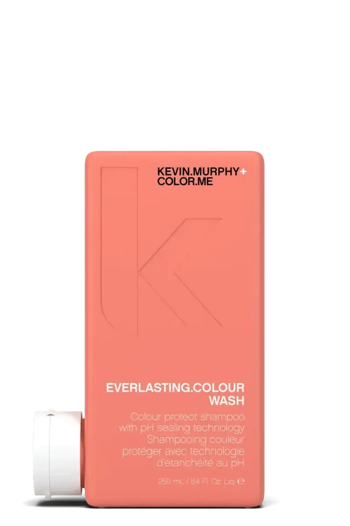 Kevin Murphy shampoo bottle with coral packaging on a white background