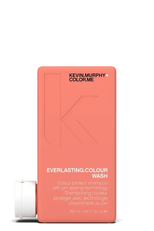 Kevin Murphy shampoo bottle with coral packaging on a white background