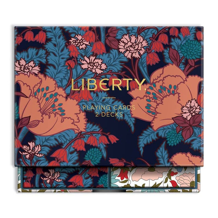 Floral-patterned playing card set with 'Liberty' branding on a white background