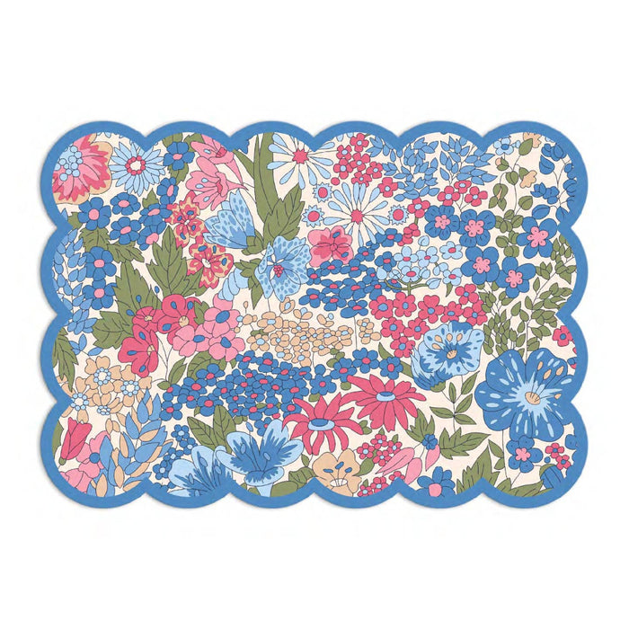 Floral card with blue, pink, and green flowers on a white background