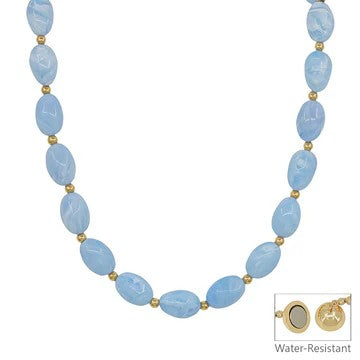 Discover effortless elegance with this enchanting light blue oval beaded necklace. Strung with luminous acrylic ovals in a breathtaking sky blue shade and accented with petite gold beads, this piece brings instant sophistication to your jewelry wardrobe. This necklace offers that coveted splash of color that feels both timeless and contemporary. Comfortable enough for everyday wear yet polished enough for special moments, it's the accessory that effortlessly elevates any ensemble.

Length: 17"