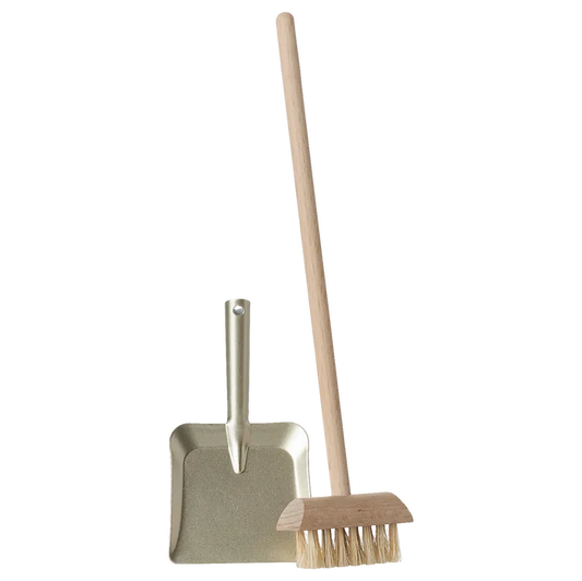 Cleaning tools including a broom and dustpan on a white background
