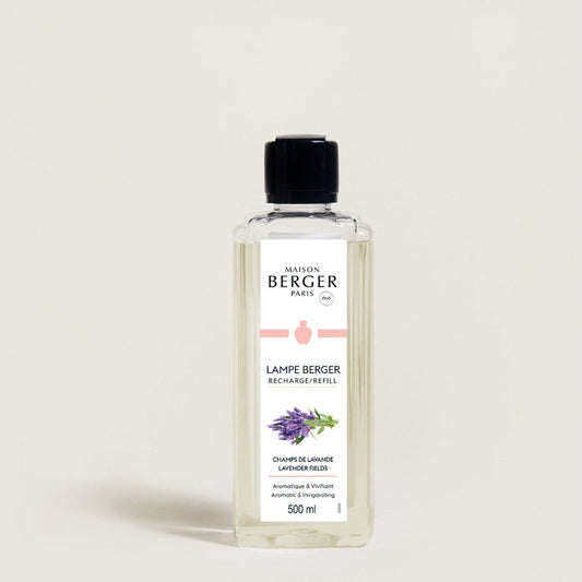 Bottle of Maison Berger refill on a light beige background