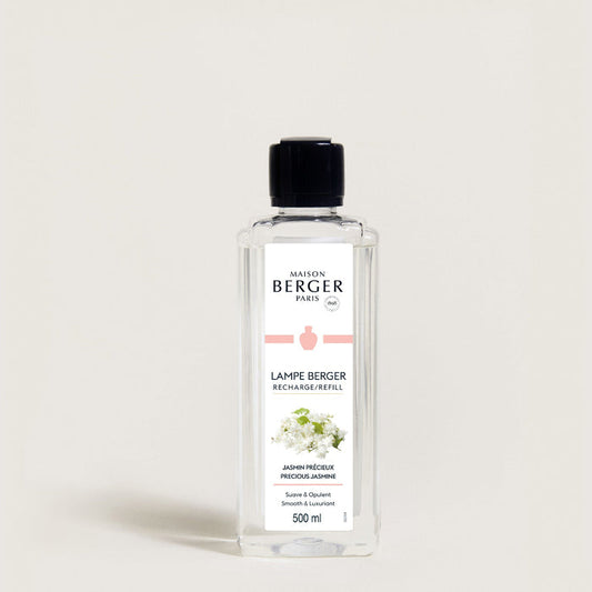Bottle of Maison Berger lamp refill on a white background