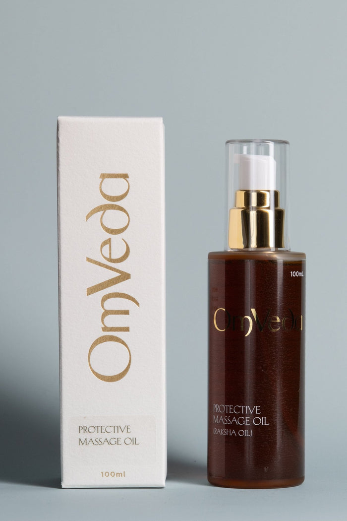 Protective massage oil in dark amber bottle with gold pump; includes 100 ml box