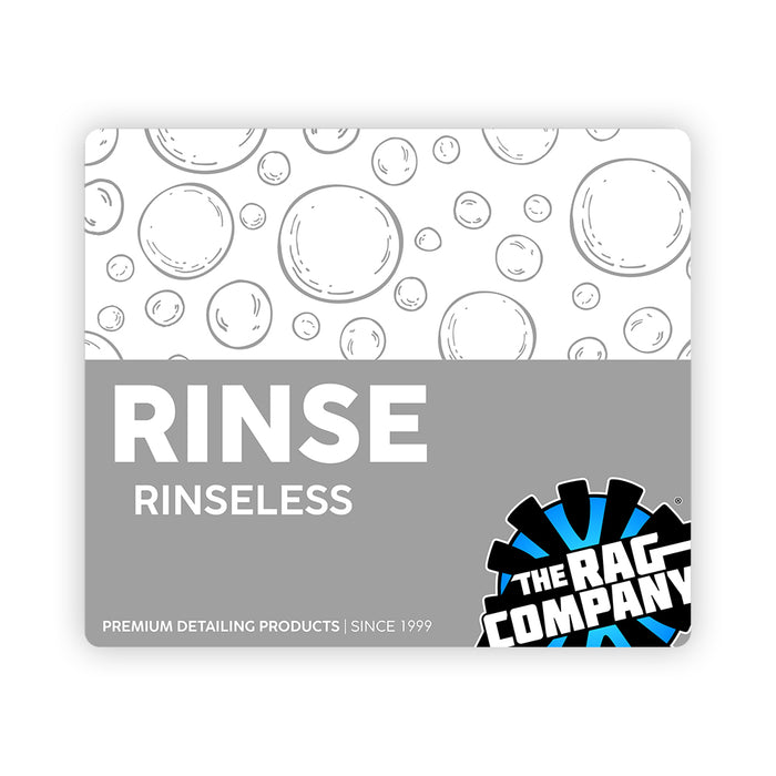 A graphic of bubbles that says 'Rinse Rinseless' with The Rag Company logo in the corner.
