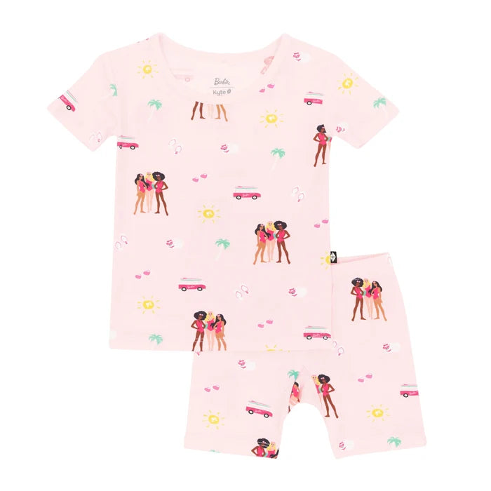 Kyte Baby girls Pink Barbie™ Beach bamboo short sleeve pajama set with matching shorts.