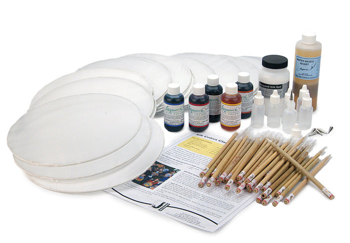 Art supply kit for up to 30: silk round canvases, dyes, water based resist, silk salt, fine tip squeeze bottles, brushes, and instructions on a white background.