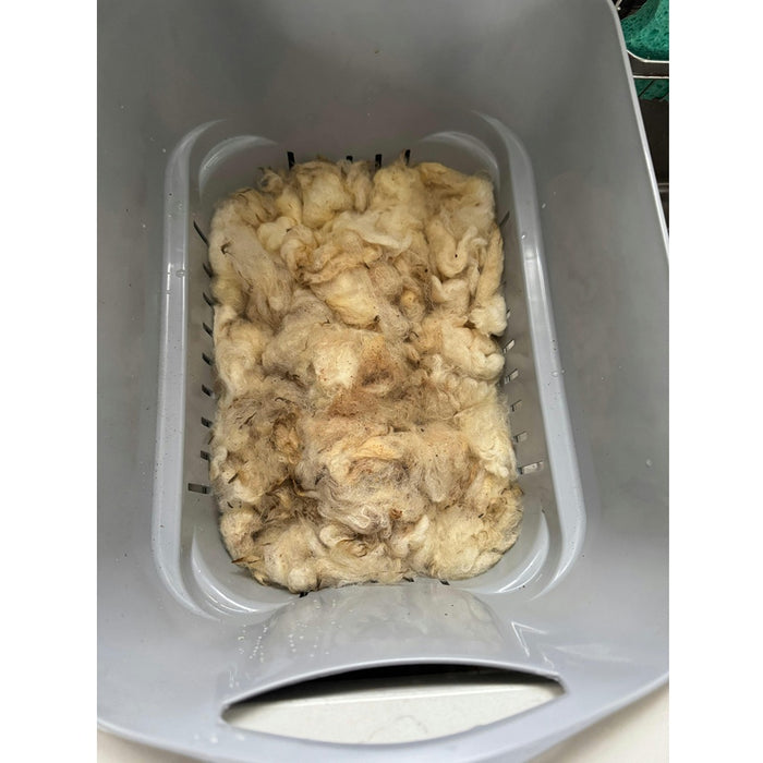 Strucket works great for scouring the "barnyard" out of your natural fibers