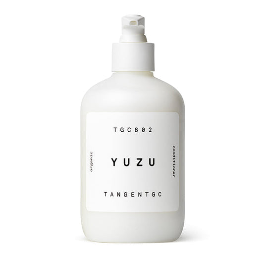 A white bottle with a pump dispenser labeled 'Yuzu Tangent GC