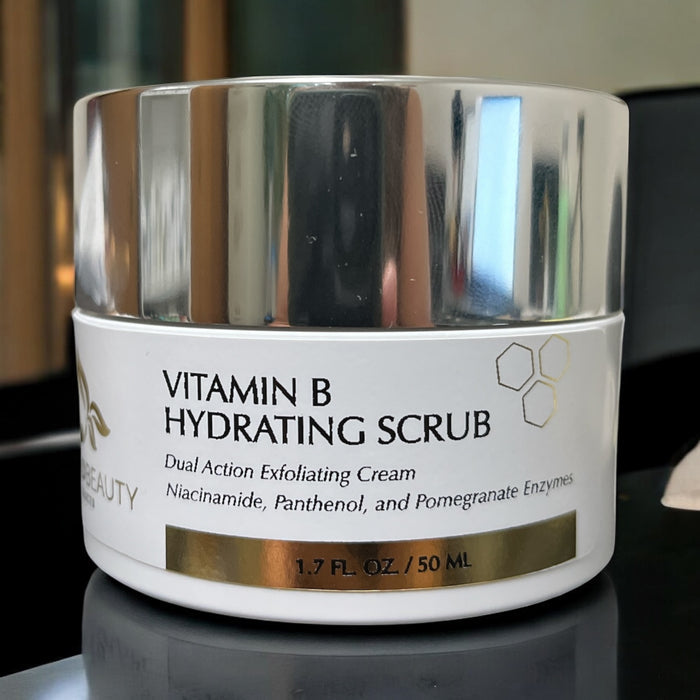 Close-up of Reiland Vitamin B Hydrating Scrub dual-action exfoliating cream jar.