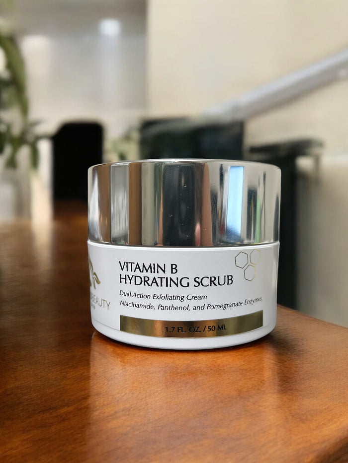Reiland Vitamin B Hydrating Scrub on wooden table, gentle daily facial exfoliator.