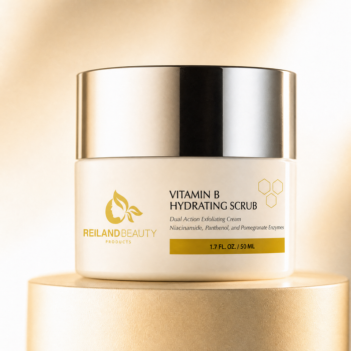 Reiland Vitamin B Hydrating Scrub jar with silver lid, close-up front label view against a warm gold background
