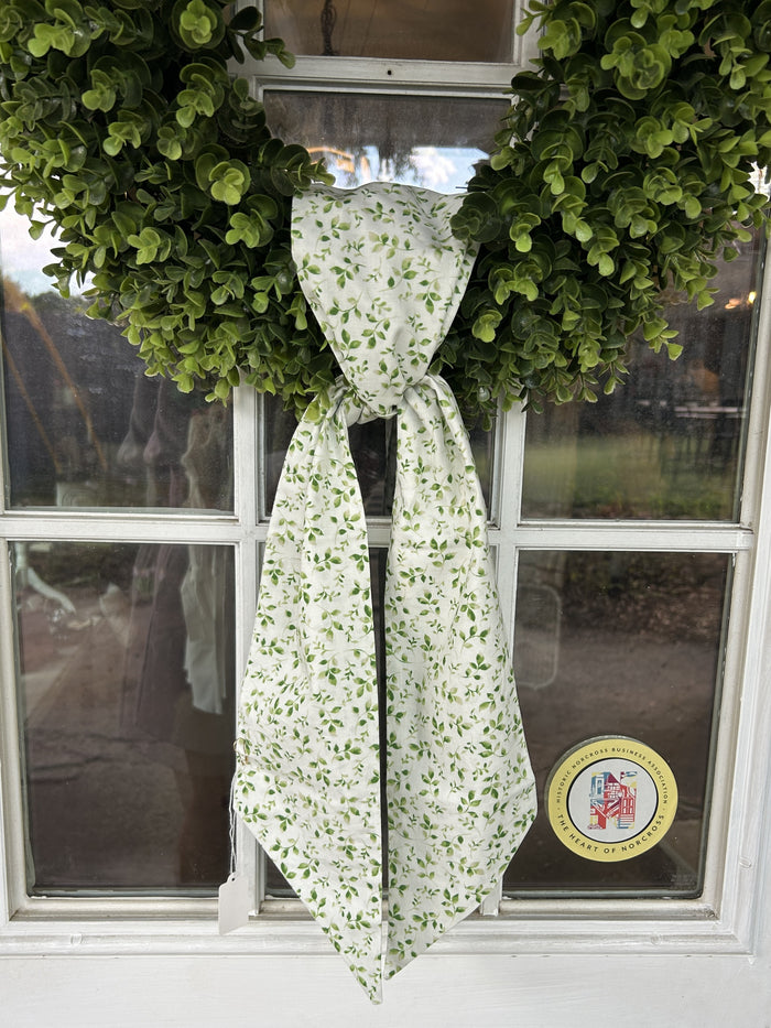 Green Leaves on Cream Background